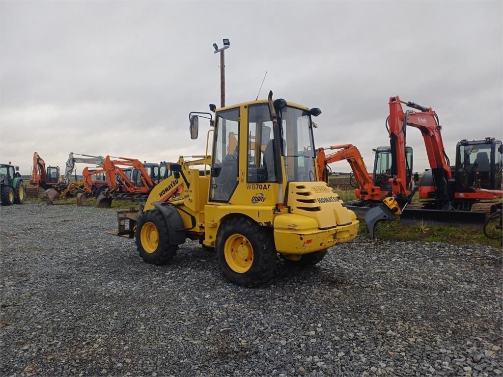 Komatsu WB70A Pyöräkuormaaja - Колёсный погрузчик: фото 3 Komatsu WB70A Pyöräkuormaaja - Колёсный погрузчик: фото 3