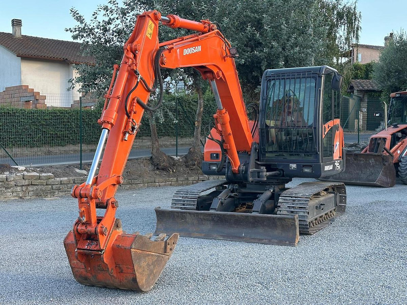 Doosan SOLAR 75V - Экскаватор: фото 1 Doosan SOLAR 75V - Экскаватор: фото 1
