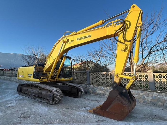 New Holland E245B - Экскаватор: фото 1 New Holland E245B - Экскаватор: фото 1