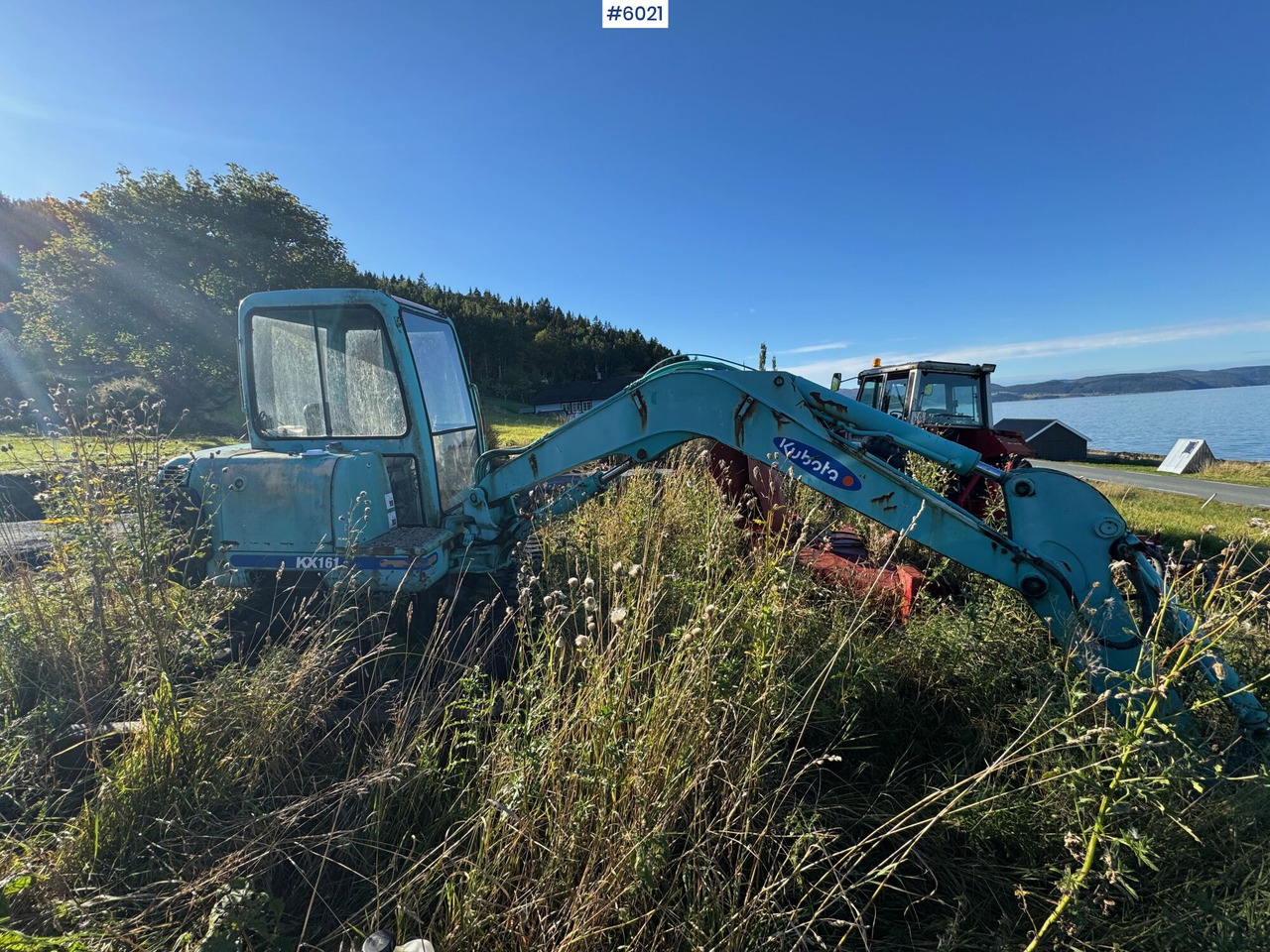 Approx.2000 Kubota KX161 w/excavator bucket and leveling bucket. Partially repaired object. - Трактор: фото 1 Approx.2000 Kubota KX161 w/excavator bucket and leveling bucket. Partially repaired object. - Трактор: фото 1