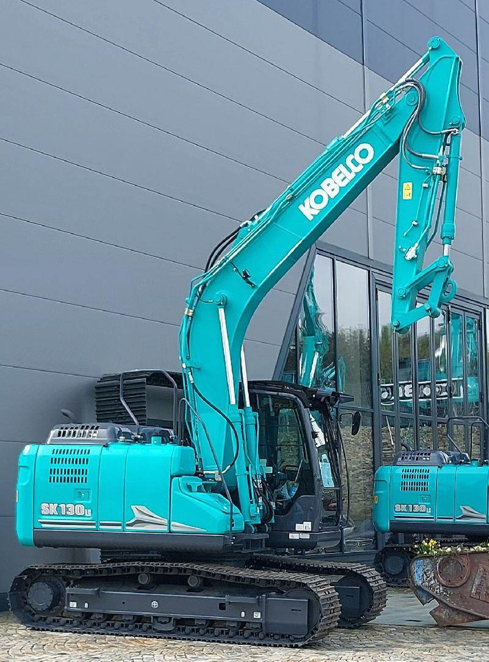 Kobelco SK130LC-11  - Гусеничный экскаватор: фото 1 Kobelco SK130LC-11  - Гусеничный экскаватор: фото 1