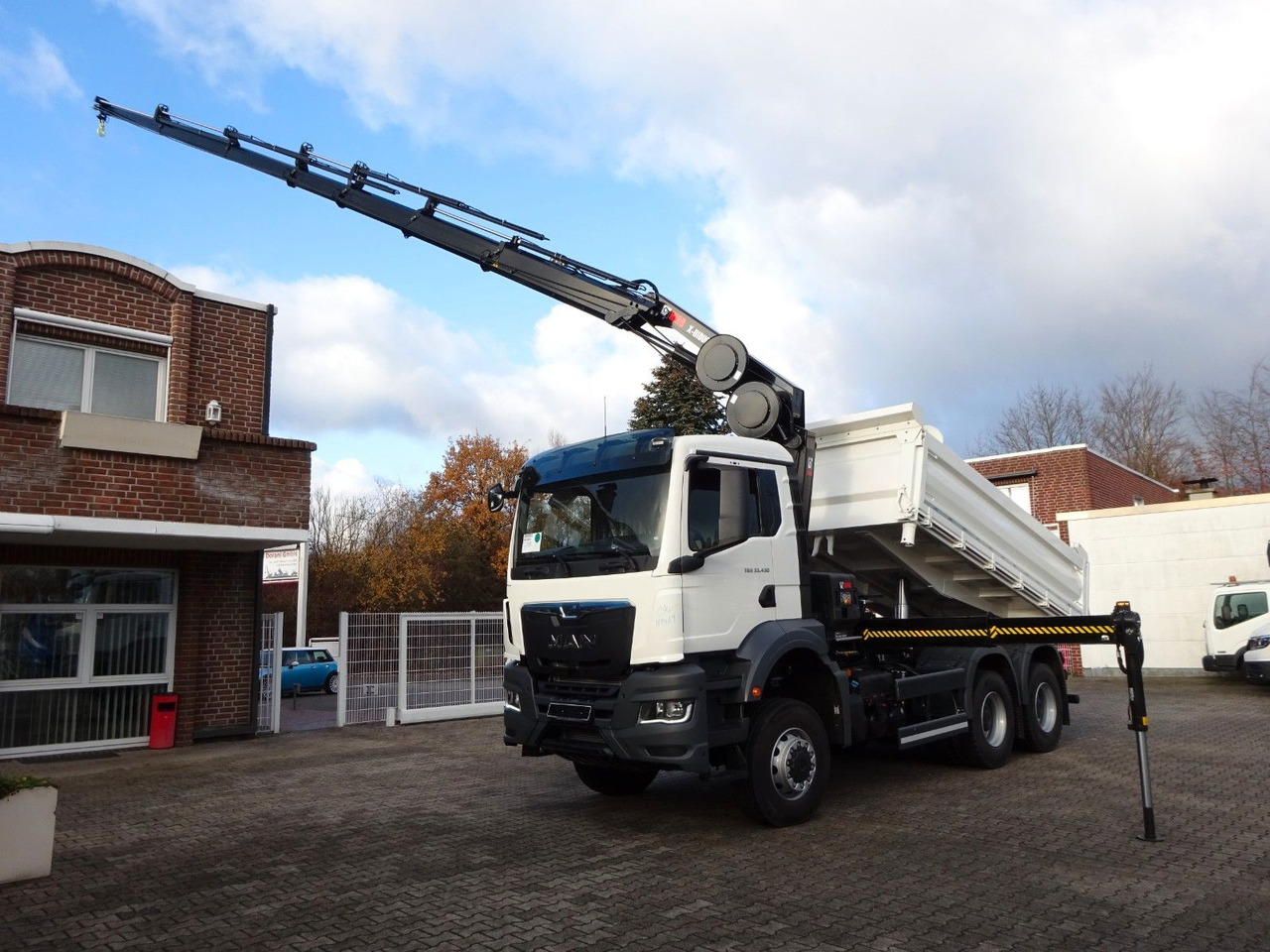 MAN 33.430 6x6 3-SEITENKIPPER KRAN HIAB 228- 6HYDRO - Самосвал, Автоманипулятор: фото 2 MAN 33.430 6x6 3-SEITENKIPPER KRAN HIAB 228- 6HYDRO - Самосвал, Автоманипулятор: фото 2