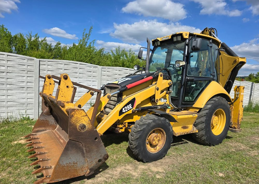 Caterpillar - Экскаватор-погрузчик: фото 1 Caterpillar - Экскаватор-погрузчик: фото 1