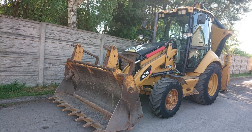 Экскаватор-погрузчик Caterpillar: фото 1