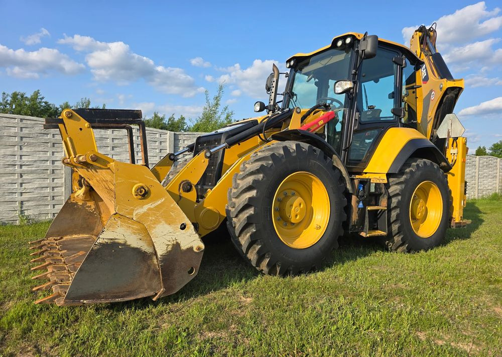 Caterpillar - Экскаватор-погрузчик: фото 1 Caterpillar - Экскаватор-погрузчик: фото 1