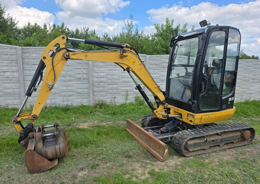 Caterpillar - Мини-экскаватор: фото 2 Caterpillar - Мини-экскаватор: фото 2