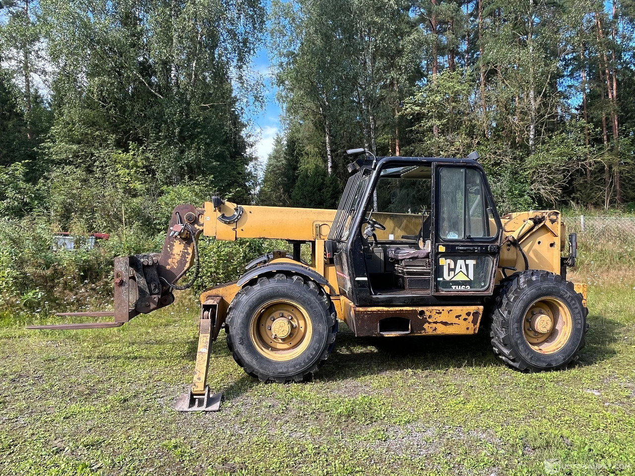 Caterpillar TH63, kurottaja piikeillä ja kauhalla, 2002, Loppi - Сельскохозяйственная техника: фото 1 Caterpillar TH63, kurottaja piikeillä ja kauhalla, 2002, Loppi - Сельскохозяйственная техника: фото 1