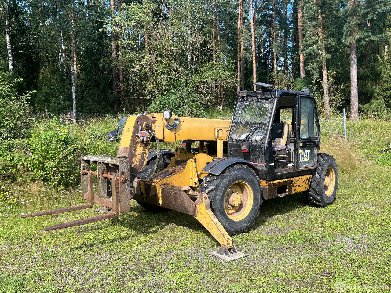 Caterpillar TH63, kurottaja piikeillä ja kauhalla, 2002, Loppi - Сельскохозяйственная техника: фото 2 Caterpillar TH63, kurottaja piikeillä ja kauhalla, 2002, Loppi - Сельскохозяйственная техника: фото 2