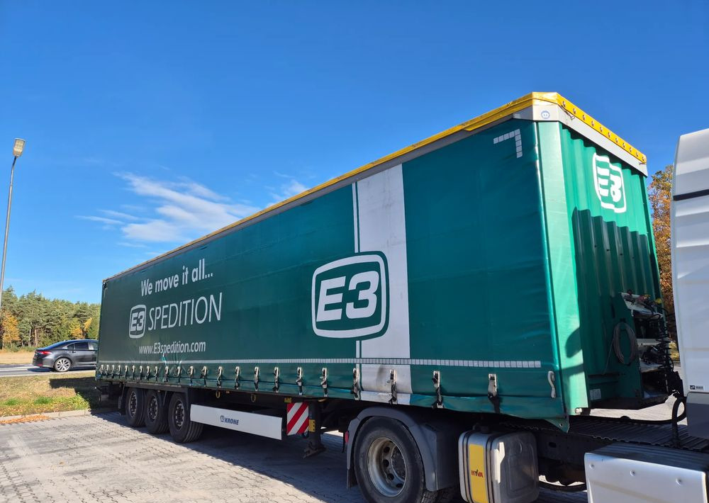 Krone BDE STANDARD PODNOSZONY DACH / z Niemiec PONADGABARYTY POSZERZANA OPONY 80% - Тентованный полуприцеп: фото 1 Krone BDE STANDARD PODNOSZONY DACH / z Niemiec PONADGABARYTY POSZERZANA OPONY 80% - Тентованный полуприцеп: фото 1