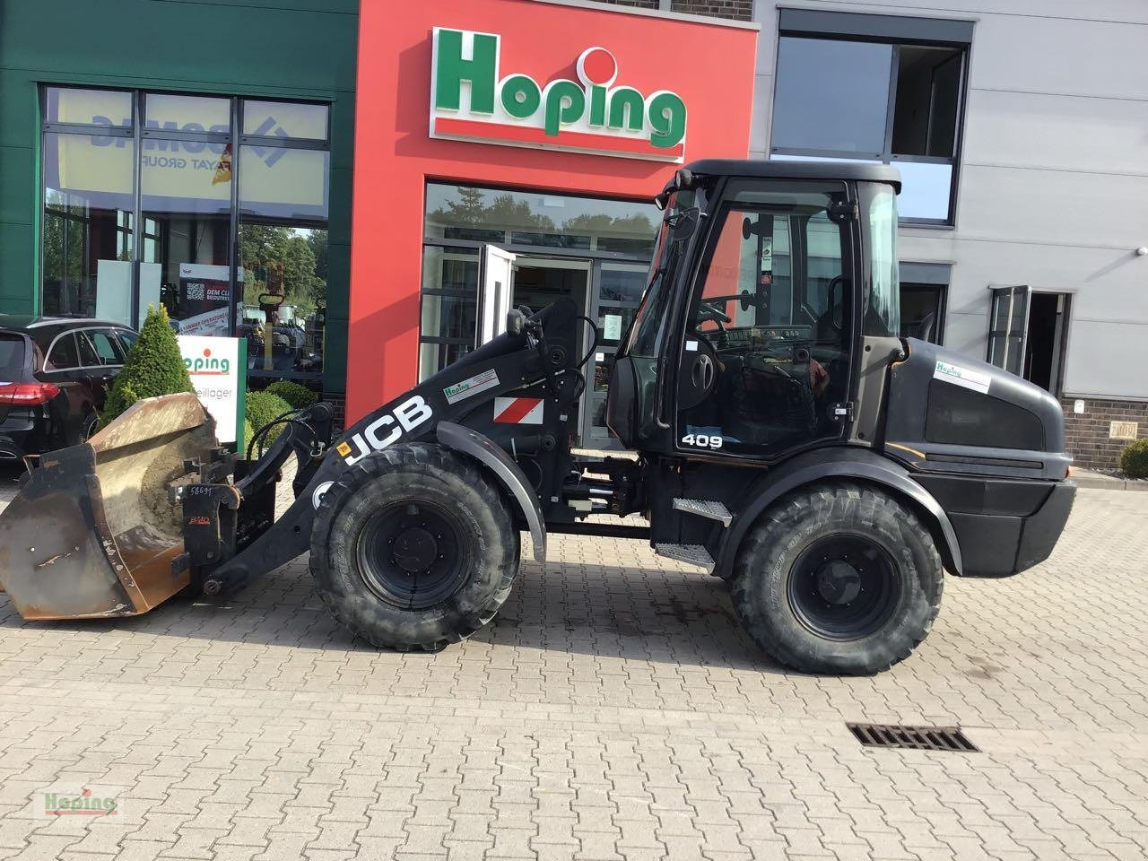 JCB 409 - Колёсный погрузчик: фото 1 JCB 409 - Колёсный погрузчик: фото 1