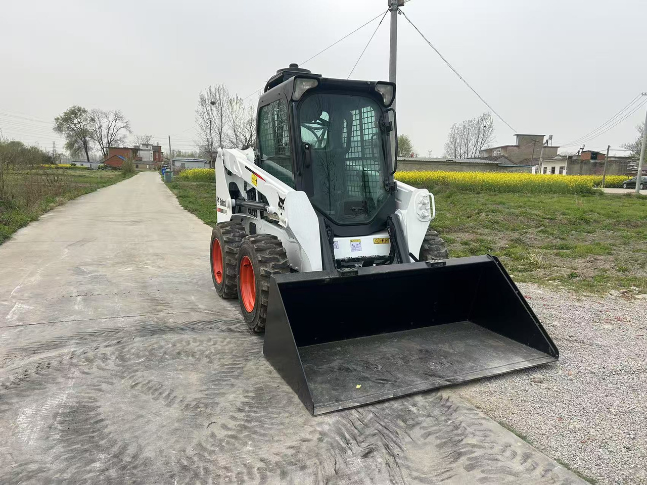 BOBCAT S550 - Мини-погрузчик с бортовым поворотом: фото 4 BOBCAT S550 - Мини-погрузчик с бортовым поворотом: фото 4