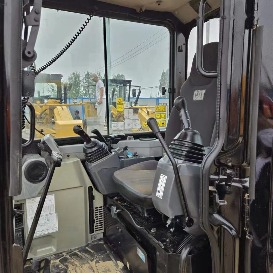 Caterpillar 303.5E2 - Мини-экскаватор: фото 2 Caterpillar 303.5E2 - Мини-экскаватор: фото 2