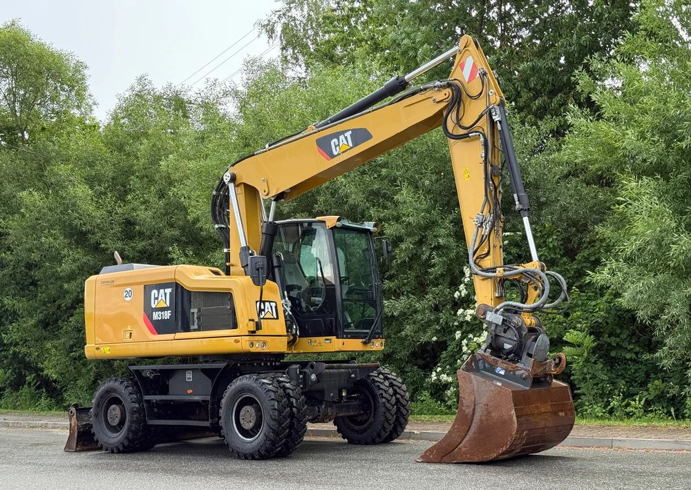 Caterpillar CAT 318 F * Powertilt * Sprowadzony* 9700 MTG * Caterpillar * Stan Perfekcyjny - Колёсный экскаватор: фото 2 Caterpillar CAT 318 F * Powertilt * Sprowadzony* 9700 MTG * Caterpillar * Stan Perfekcyjny - Колёсный экскаватор: фото 2