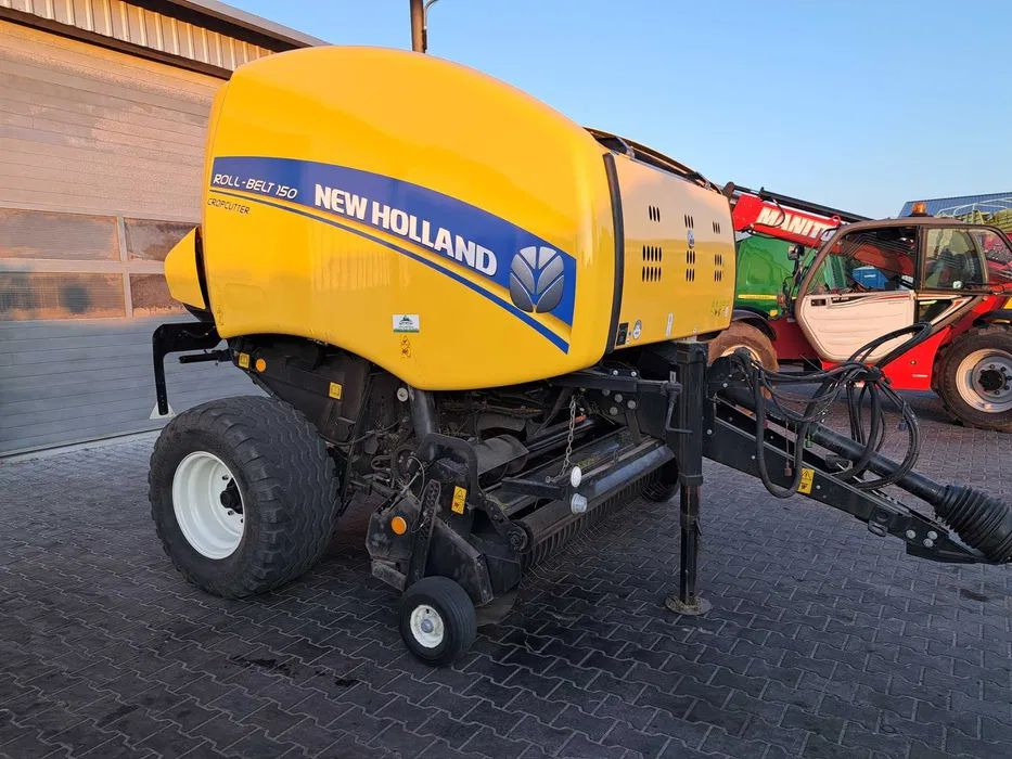 New Holland ROLL-BELT 150 cropcutter - Пресс-подборщик рулонный: фото 1 New Holland ROLL-BELT 150 cropcutter - Пресс-подборщик рулонный: фото 1