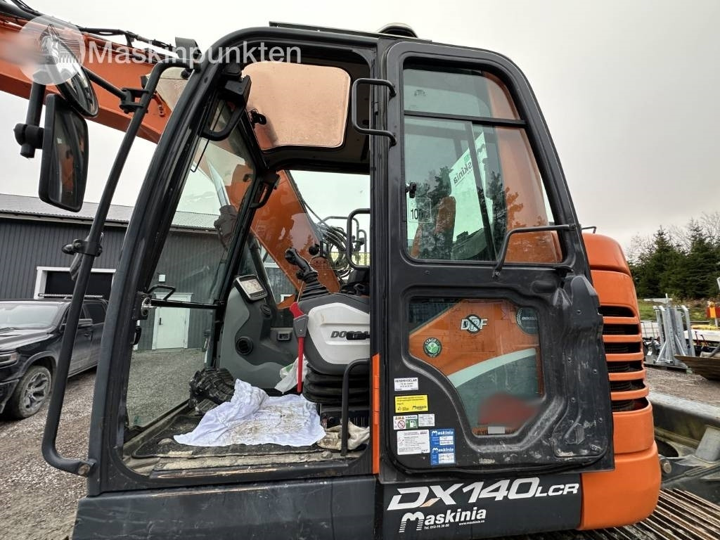 Гусеничный экскаватор Doosan DX 140 LCR-5: фото 13 Гусеничный экскаватор Doosan DX 140 LCR-5: фото 13