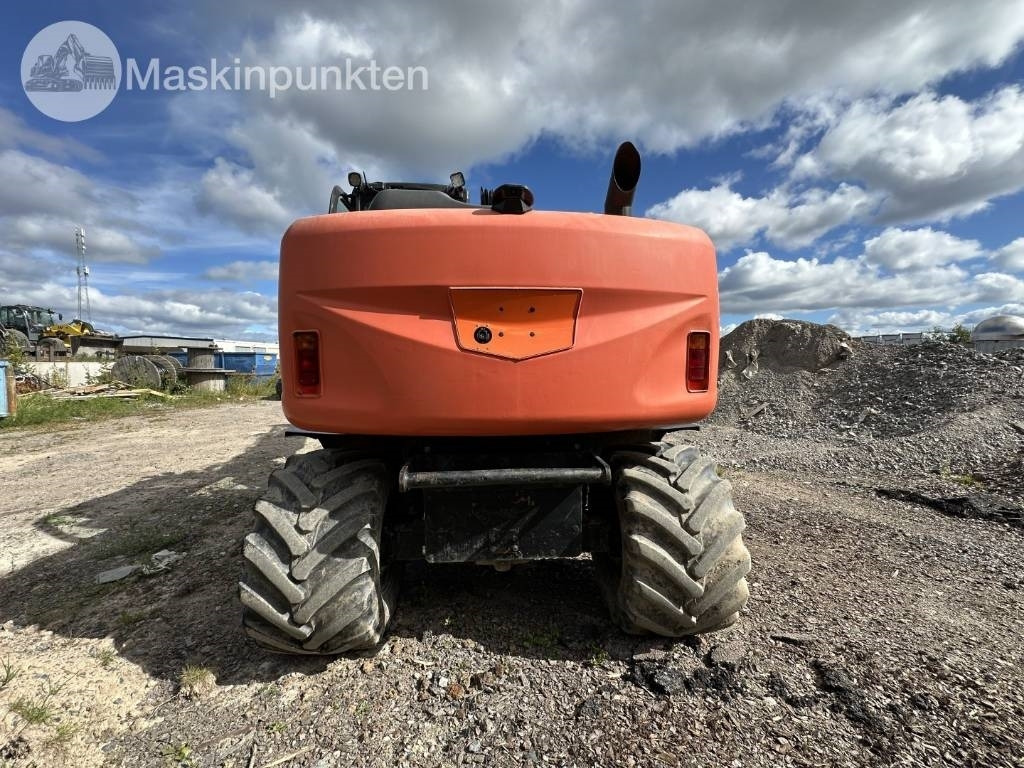 Колёсный экскаватор Hitachi ZX 140 W-5B: фото 6