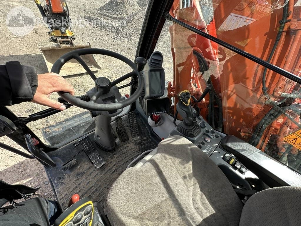 Колёсный экскаватор Hitachi ZX 140 W-5B: фото 15