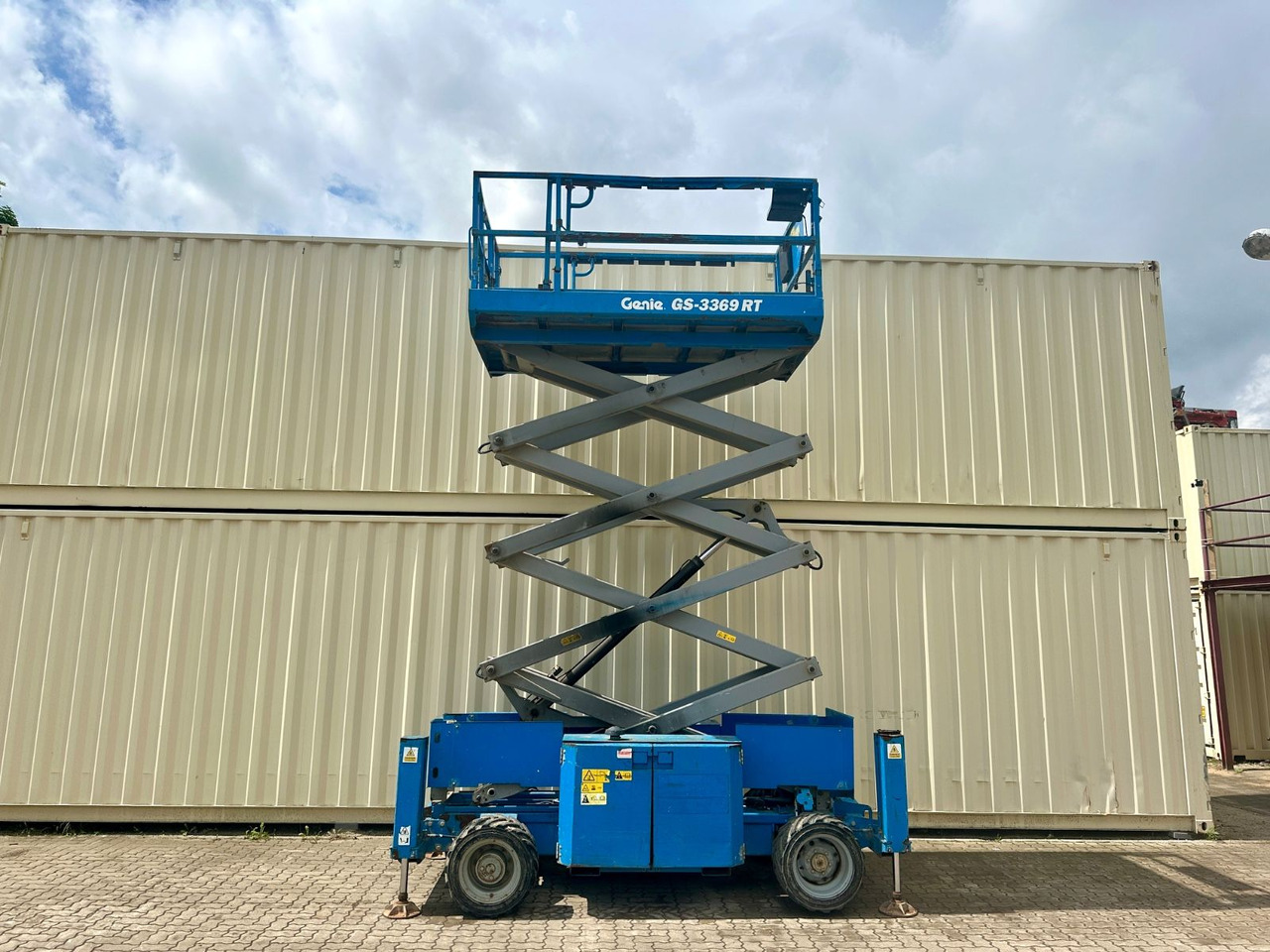 Ножничный подъемник Genie GS3369RT 4x4 Scherenbühne, 12 Meter: фото 1