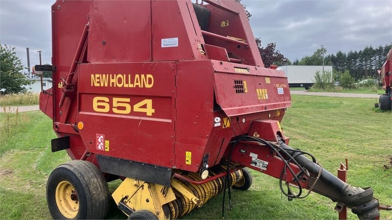 New Holland 654 RUNDBALLEPRESSER Cropcutter - Пресс-подборщик рулонный: фото 1 New Holland 654 RUNDBALLEPRESSER Cropcutter - Пресс-подборщик рулонный: фото 1