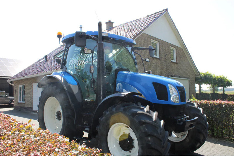New Holland TS100A TS 100a - Трактор: фото 1 New Holland TS100A TS 100a - Трактор: фото 1