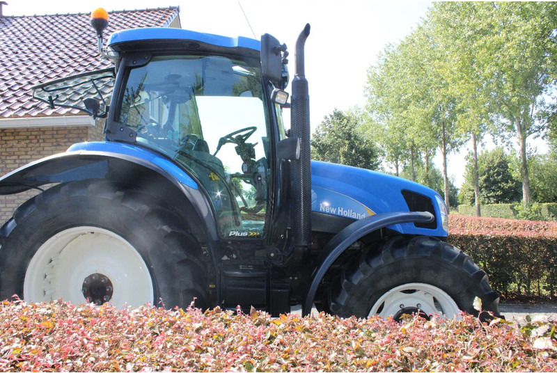 New Holland TS100A TS 100a - Трактор: фото 2 New Holland TS100A TS 100a - Трактор: фото 2