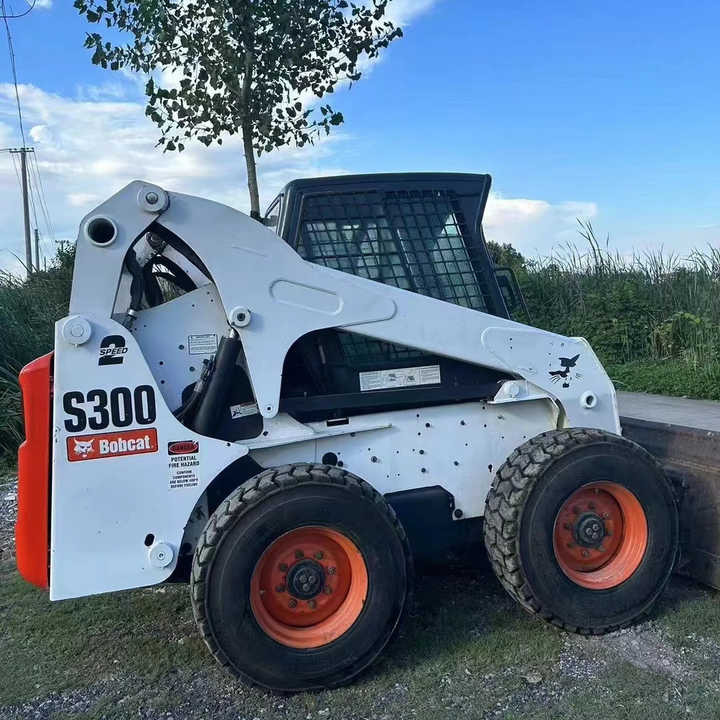 Used Bob Cat Bob Cat S300 Used Mini Skid Steer Wheel Loader Multifunctional Track Loaders Bobcat S300 - Мини-погрузчик с бортовым поворотом: фото 2 Used Bob Cat Bob Cat S300 Used Mini Skid Steer Wheel Loader Multifunctional Track Loaders Bobcat S300 - Мини-погрузчик с бортовым поворотом: фото 2
