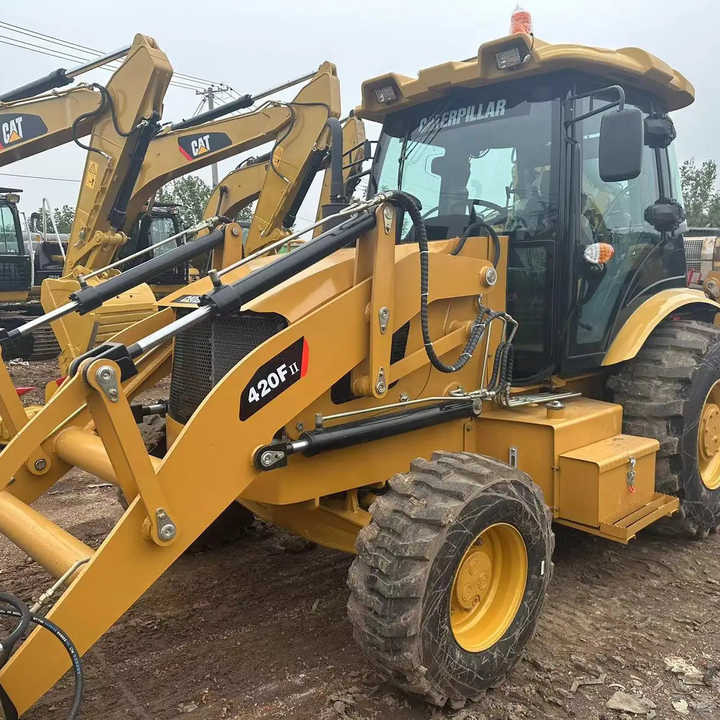 Used Wheel Loader CAT420F Caterpillar 420F Mini Construction Machinery Mini Wheel Skid Steer Loader in Stock - Экскаватор-погрузчик: фото 1 Used Wheel Loader CAT420F Caterpillar 420F Mini Construction Machinery Mini Wheel Skid Steer Loader in Stock - Экскаватор-погрузчик: фото 1