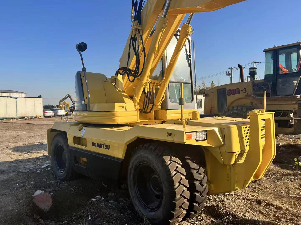 KOMATSU PC128US - Колёсный экскаватор: фото 3 KOMATSU PC128US - Колёсный экскаватор: фото 3