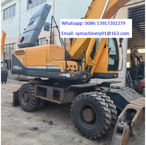 Hyundai R210W - Колёсный экскаватор: фото 4 Hyundai R210W - Колёсный экскаватор: фото 4