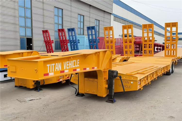 TITAN 2 Axle 50 Ton Low Bed Trailer for Sale In Nigeria Lagos - Низкорамный полуприцеп: фото 1 TITAN 2 Axle 50 Ton Low Bed Trailer for Sale In Nigeria Lagos - Низкорамный полуприцеп: фото 1