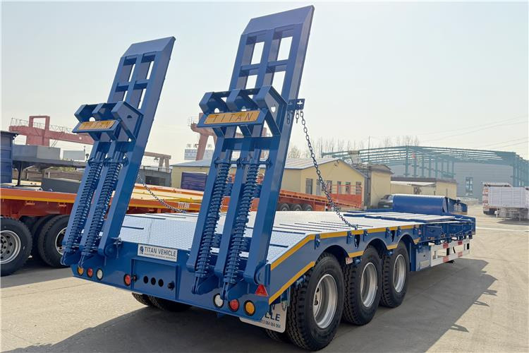 TITAN 3 Axle 80 Ton Low Bed Trailer Price for Sale In Nigeria - Низкорамный полуприцеп: фото 5 TITAN 3 Axle 80 Ton Low Bed Trailer Price for Sale In Nigeria - Низкорамный полуприцеп: фото 5