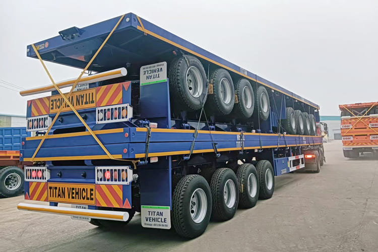 TITAN 4 Axle 80 Ton Flat Bed Trailer for Sale in Saudi Arabia - Полуприцеп бортовой/ Платформа: фото 1 TITAN 4 Axle 80 Ton Flat Bed Trailer for Sale in Saudi Arabia - Полуприцеп бортовой/ Платформа: фото 1