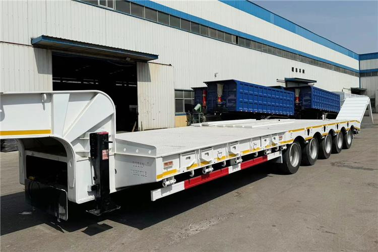 TITAN 5 Axle 100 Ton Low Bed Trailer for Sale In Tanzania - Низкорамный полуприцеп: фото 4 TITAN 5 Axle 100 Ton Low Bed Trailer for Sale In Tanzania - Низкорамный полуприцеп: фото 4