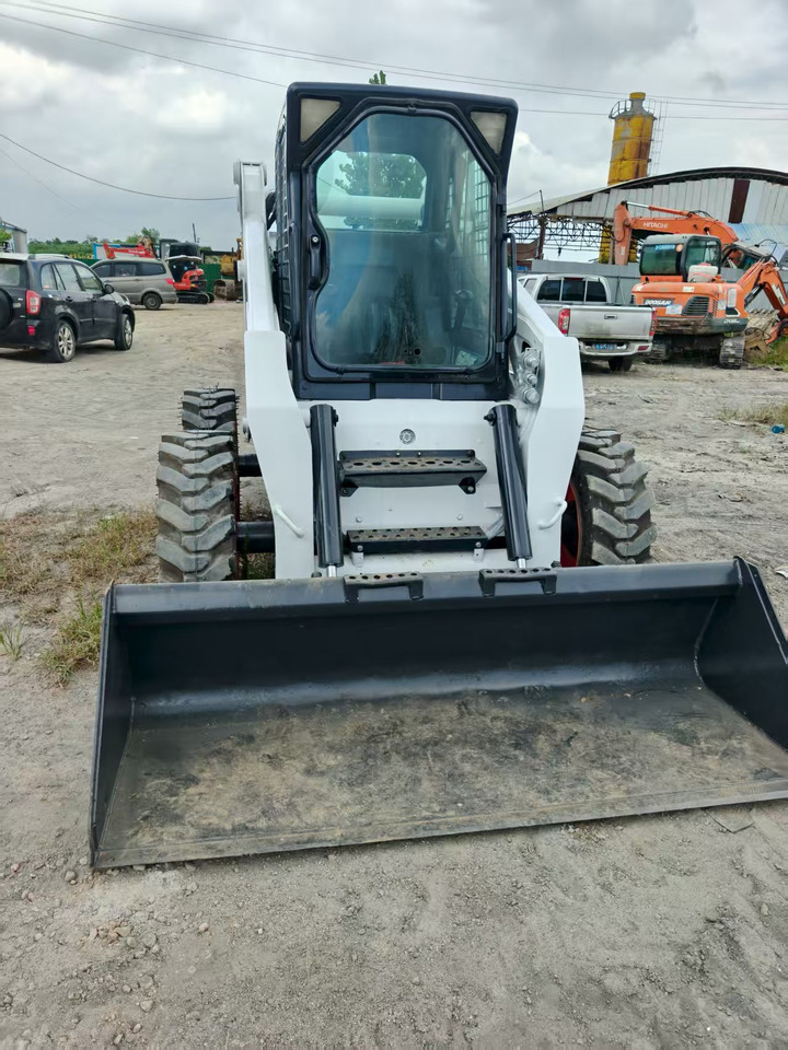 Мини-погрузчик с бортовым поворотом BOBCAT skid steer loader S300: фото 6