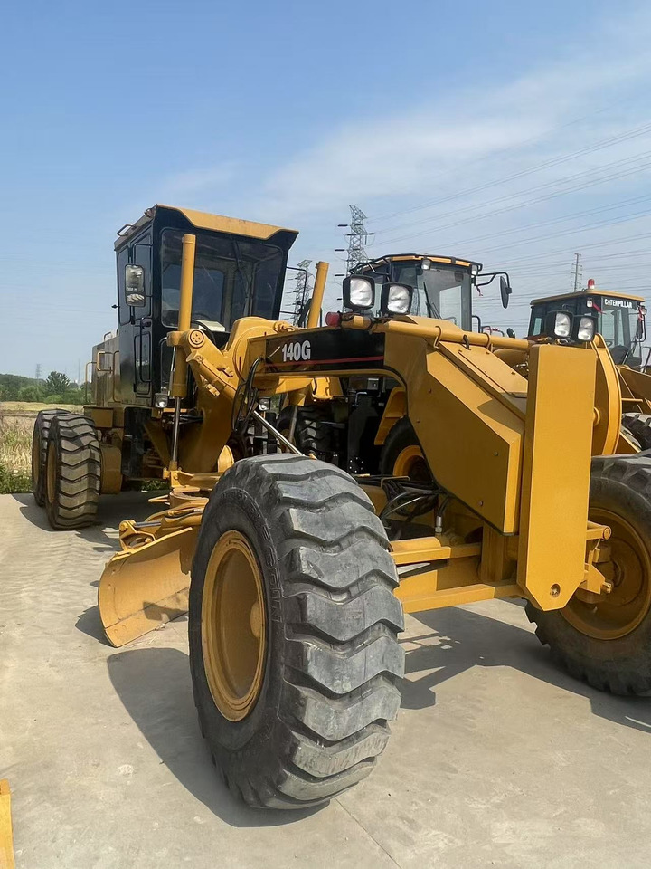 CATERPILLAR 140g used motor grader Source supply low price Road construction equipment - Грейдер: фото 5 CATERPILLAR 140g used motor grader Source supply low price Road construction equipment - Грейдер: фото 5