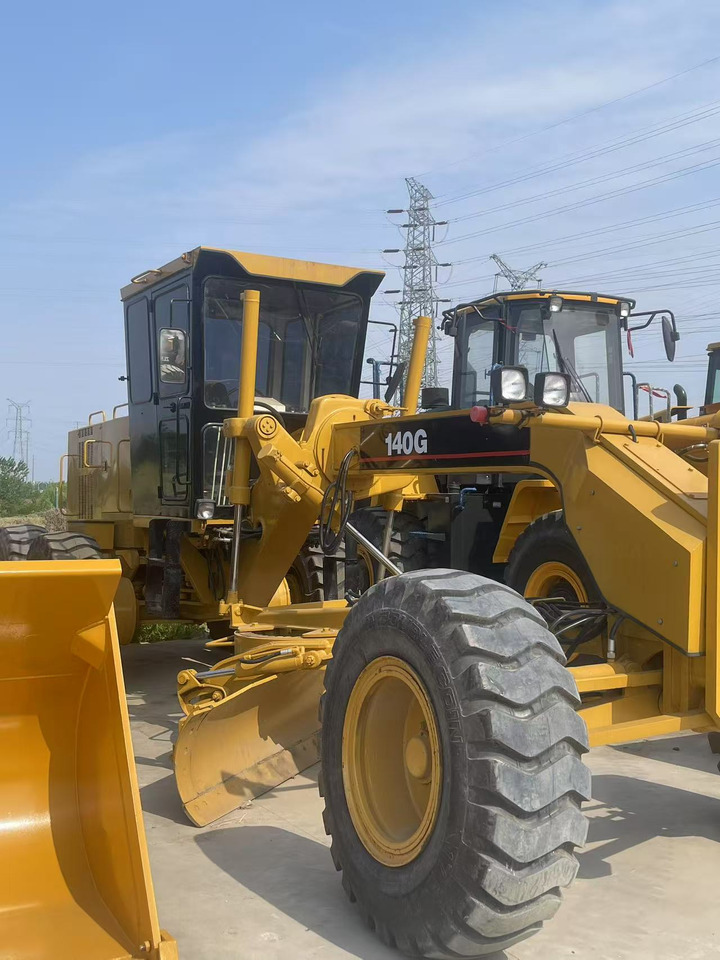 CATERPILLAR 140g used motor grader Source supply low price Road construction equipment - Грейдер: фото 1 CATERPILLAR 140g used motor grader Source supply low price Road construction equipment - Грейдер: фото 1