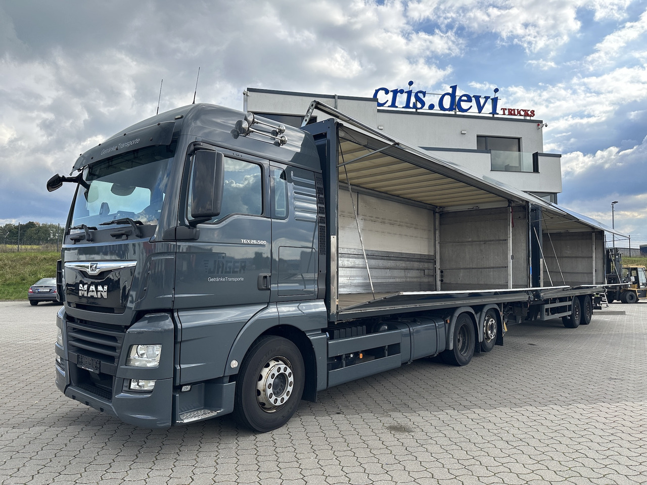 MAN TGX 26.500 6x2 LL Intarder Getränkezug LBW Ameise - Грузовик для перевозки напитков: фото 1 MAN TGX 26.500 6x2 LL Intarder Getränkezug LBW Ameise - Грузовик для перевозки напитков: фото 1