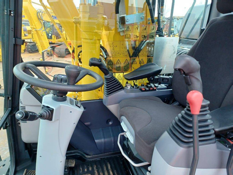Komatsu PW180-11E0 - Колёсный экскаватор: фото 4 Komatsu PW180-11E0 - Колёсный экскаватор: фото 4