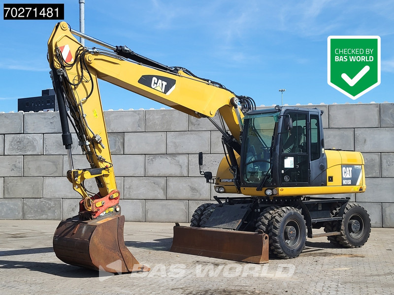 Caterpillar M315 D - Колёсный экскаватор: фото 1 Caterpillar M315 D - Колёсный экскаватор: фото 1