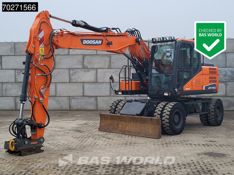 Doosan DX140 W-5 OIL QUICK - GERMAN - Колёсный экскаватор: фото 1 Doosan DX140 W-5 OIL QUICK - GERMAN - Колёсный экскаватор: фото 1