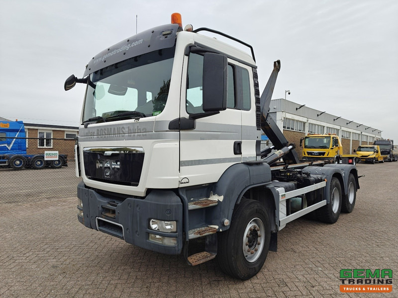 MAN TGS-TGX 26.440 6x4 Dagcabine Euro5 - AJK 20T HaakarmSysteem - Volledig Bladgeveerd - Naafreductie - Handgeschakeld - Крюковой мультилифт: фото 1 MAN TGS-TGX 26.440 6x4 Dagcabine Euro5 - AJK 20T HaakarmSysteem - Volledig Bladgeveerd - Naafreductie - Handgeschakeld - Крюковой мультилифт: фото 1