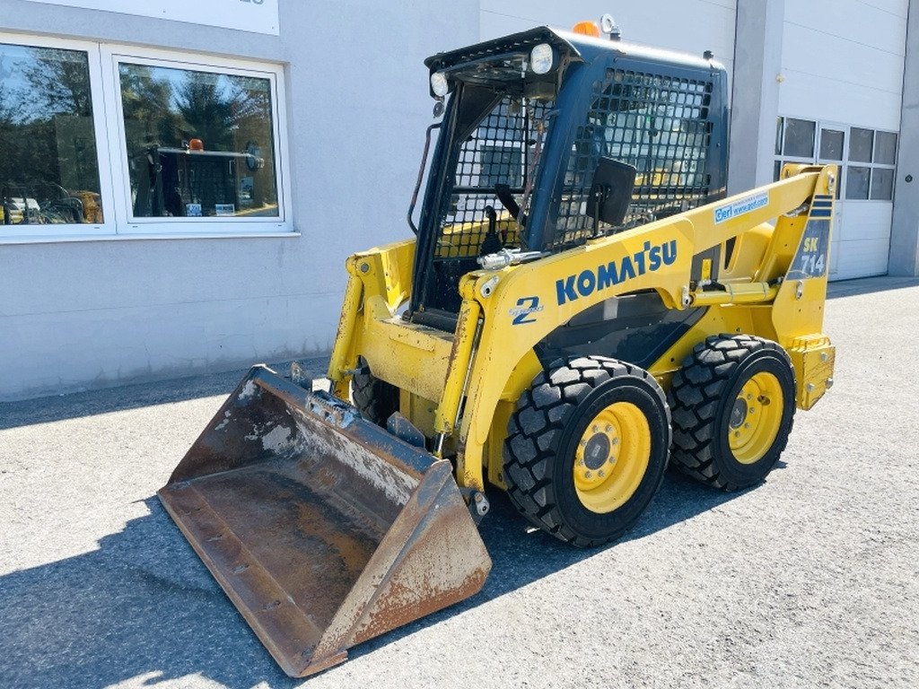 Komatsu SK714-5 (4065) - Мини-погрузчик с бортовым поворотом: фото 4 Komatsu SK714-5 (4065) - Мини-погрузчик с бортовым поворотом: фото 4