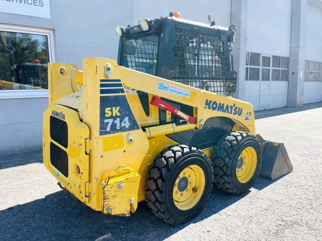 Мини-погрузчик с бортовым поворотом Komatsu SK714-5 (4066): фото 7
