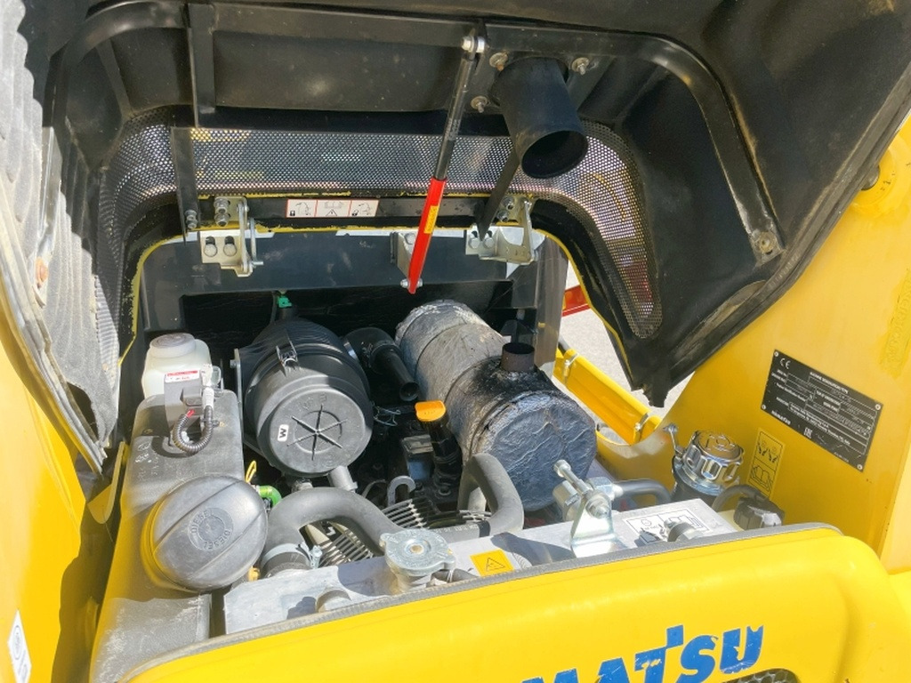 Мини-погрузчик с бортовым поворотом Komatsu SK714-5 (4066): фото 8