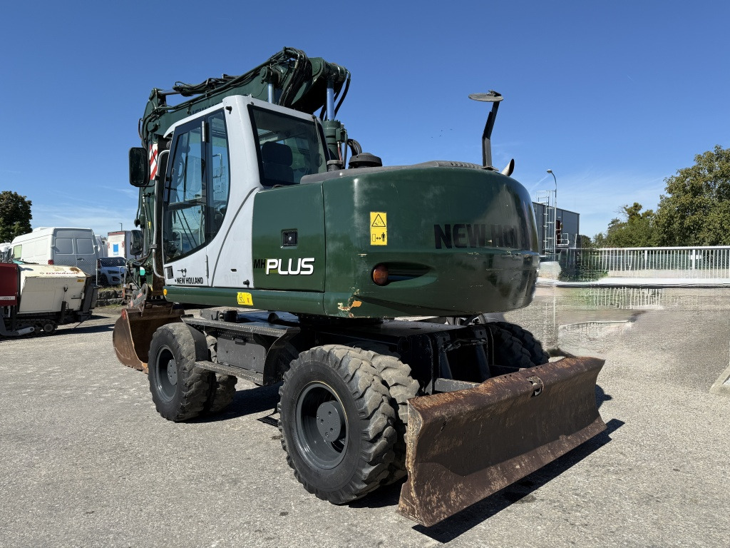 New Holland MH-Plus (111695) - Колёсный экскаватор: фото 4 New Holland MH-Plus (111695) - Колёсный экскаватор: фото 4
