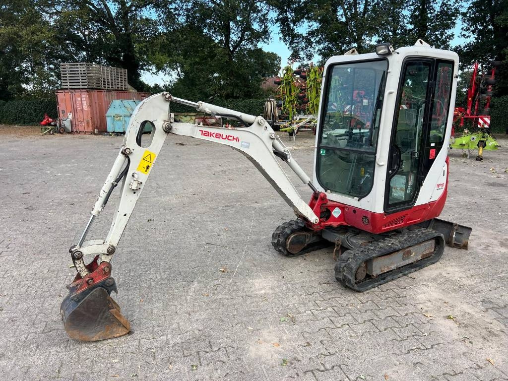 Takeuchi TB 216 - Мини-экскаватор: фото 1 Takeuchi TB 216 - Мини-экскаватор: фото 1