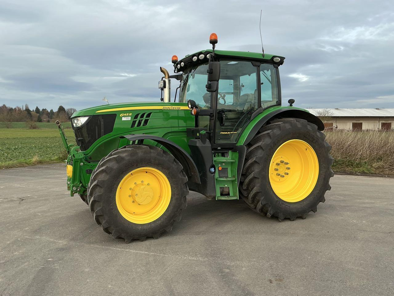 John Deere 6145 R Premium - Трактор: фото 1 John Deere 6145 R Premium - Трактор: фото 1