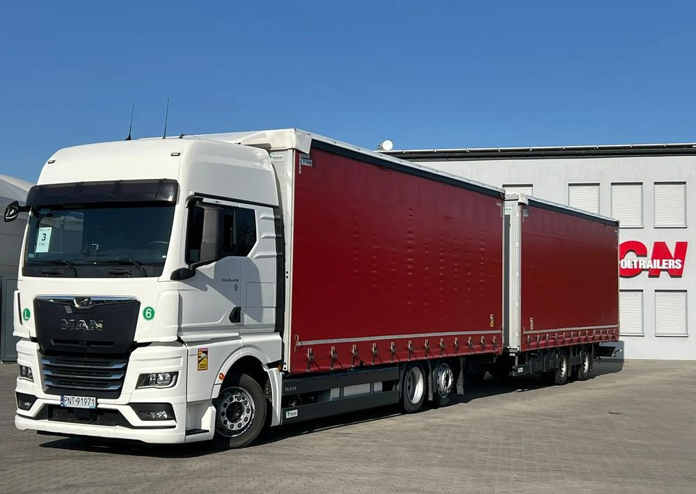 MAN TGX 26.470 z przyczepą Redos - Тентованный грузовик, Тентованный прицеп: фото 1 MAN TGX 26.470 z przyczepą Redos - Тентованный грузовик, Тентованный прицеп: фото 1