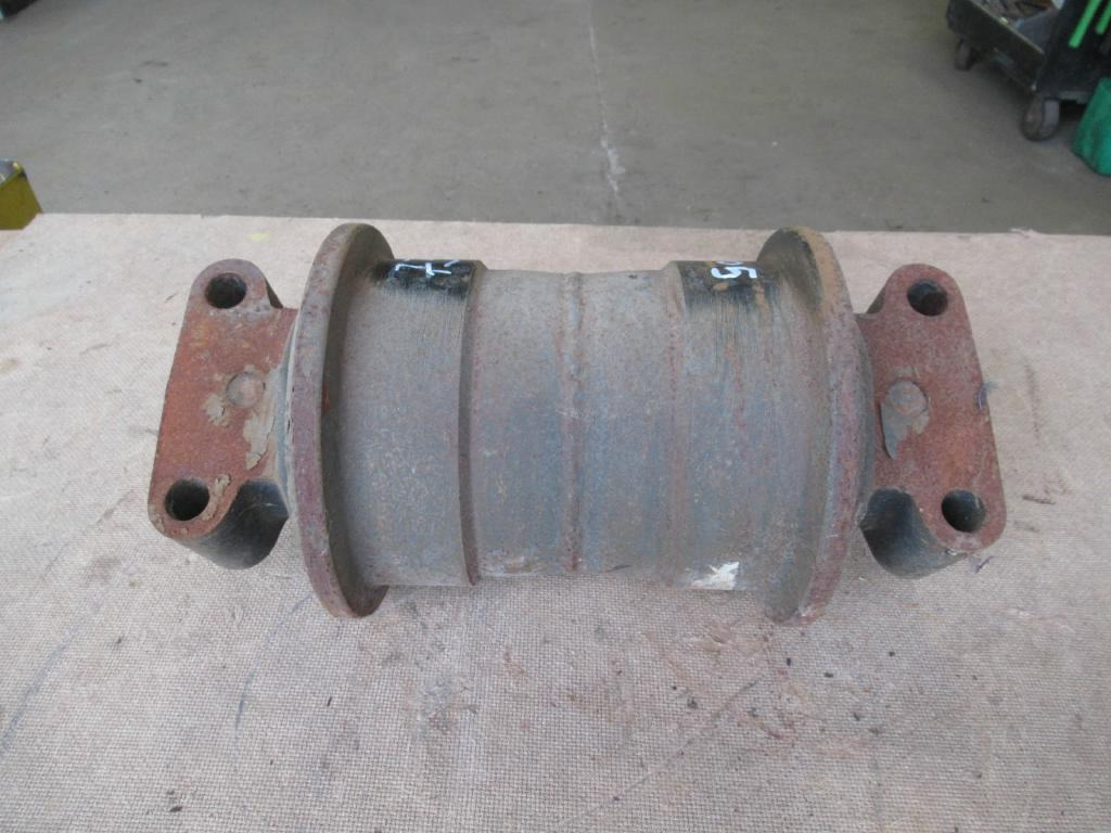 New Holland 73181638 - Опорный каток для Строительной техники: фото 1 New Holland 73181638 - Опорный каток для Строительной техники: фото 1