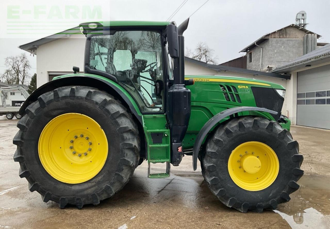 Трактор John Deere 6215r: фото 7